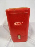 Red Coleman Model 210 A Lantern in a Metal Case