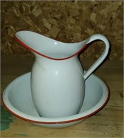 Red enamelware pitcher and basin