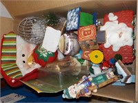 box of Christmas related, stocking, house etc.