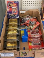 FOUR PACKAGES OF STOCK RODS 3:25 DIE-CAST CARS