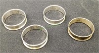 Lot of four sterling silver napkin rings 31g.