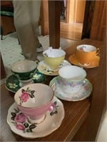 5 cups and saucers, various names