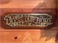 BLESS OUR HOME 17" BRASS ON WOOD