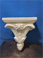 Cream-colored ceramic wall shelf 8 inches high 6