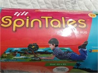 New Interactive Spin tales Rug Never used look at