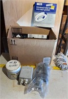 Box of misc plumbing & electrical supplies