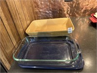 1 Pyrex baking dish, and 1 signature baking dish