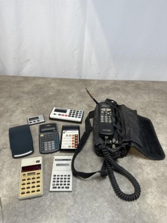 Assortment of Calculators and Car Phone