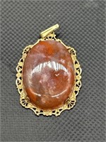 12kt Gold Pendant w/ Red Stone