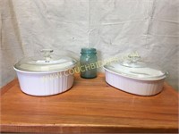 Oval and round Corningware casserole dishes
