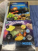 Solar system model, and earth science kit, both