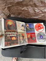 Various CDs in carrying case