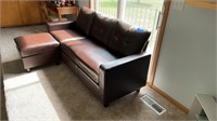Brown (false leather) couch & ottoman