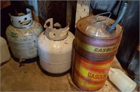 Two empty LP tanks &  two metal gasoline cans