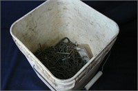 BUCKET OF NAILS, SCREWS, STAPLES, AND MORE