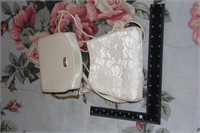 2 small white pursez