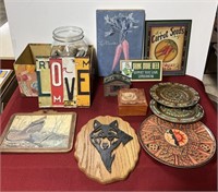 Group of interior signs, decoration and large jar