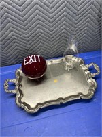 Exit light globe, tray, and a kerosene lamp