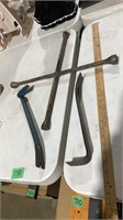 Two crowbars and tire iron