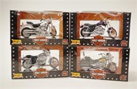 Four Harley Davidson Series 2000 motorcycles