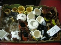 Box of assorted cream and sugar containers