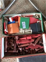 Box of Lincoln logs and vintage Lego-style blocks