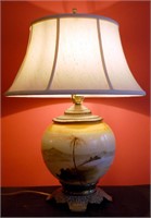 AN ANTIQUE PAINTED PORCELAIN FLUID LAMP BASE