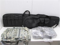 Two tactical long gun cases with mag pouches