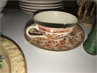 GOLD IMARI CUP AND SAUCER- CUP HAS SMALL CHIP