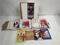 Shirley Temple doll with 4 outfits and literature