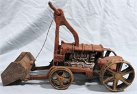 VINTAGE CAST IRON FRONT LOADING TRACTOR