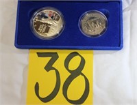 1986 mint set silver dollar and 1/2 dollar