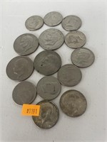 Vintage Eisenhower dollar coins and JFK 50 cent