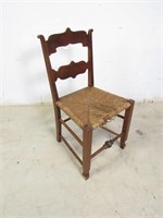 Brown Wooden Chair w/ Straw Type Seat