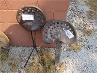 Two Vintage Metal Tractor Seats