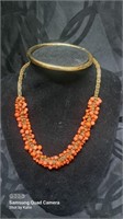 Ladies choker style gold tone and coral bead