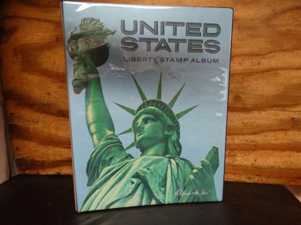 United States Liberty Stamp Album with Many Stamps