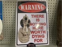 NOTHING WORTH DYING FOR SIGN