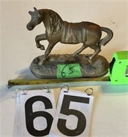 Horse statue top of clock