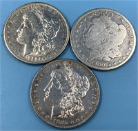 3 Morgan silver dollars: 1890, 1885, 1900 O