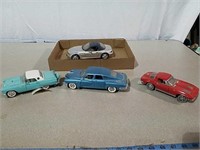 4 model cars some are  from Franklin Mint