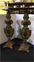 Candle holders, one pair of large cast iron