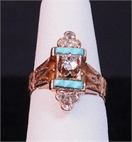 A Victorian ring marked 14K with diamonds