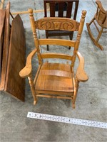 child size antique carved rocking chair
