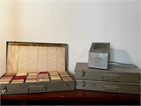 Brumberger projector and 3 metal cases of film