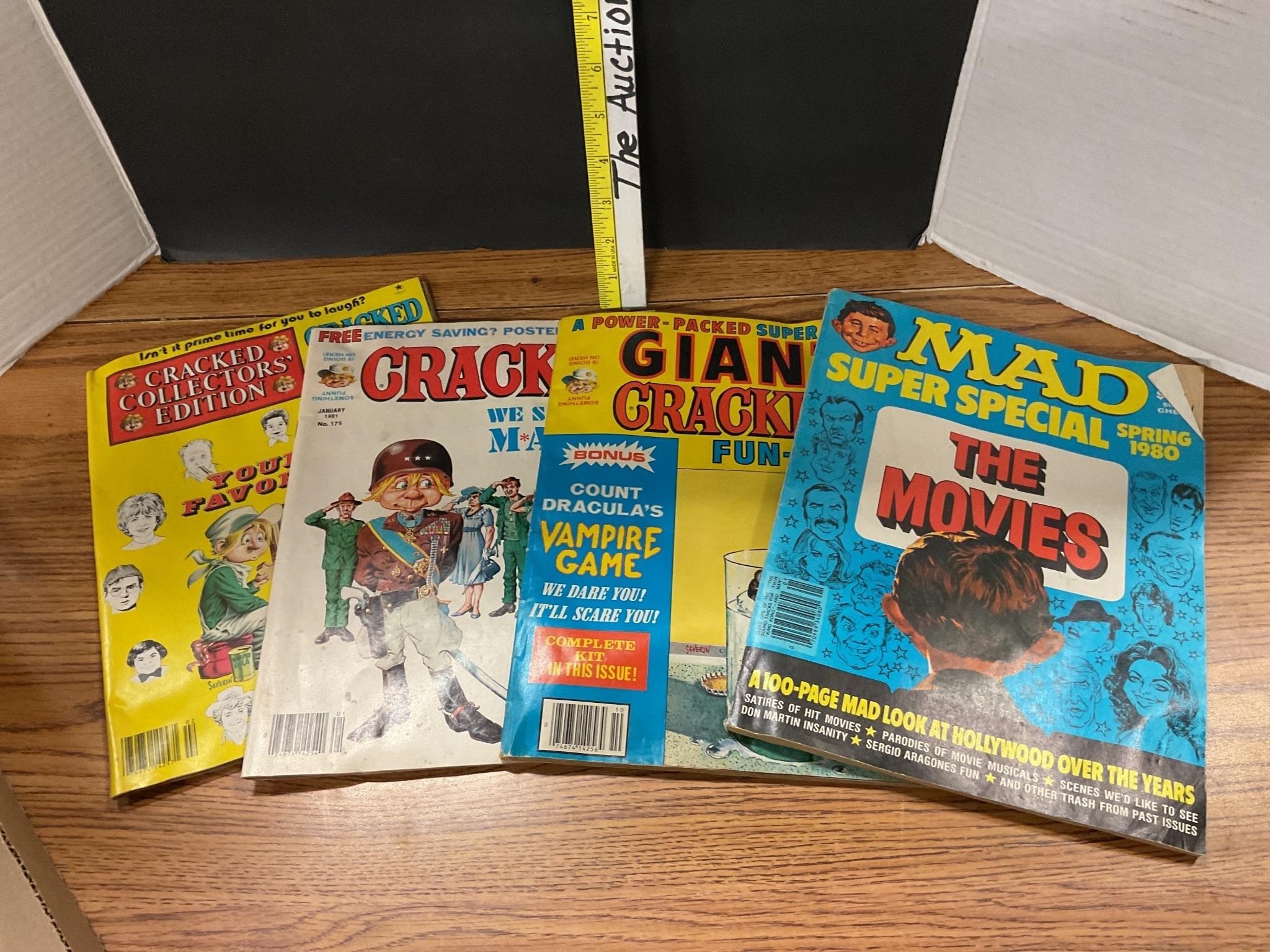 Three cracked magazines and one mad comic books