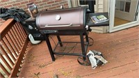 Pit Boss grill and pellets and cover