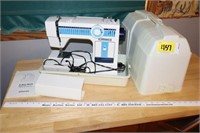 JC Penney Deluxe sewing machine in case