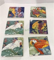 A lot of six exotic themed ceramic tiles each