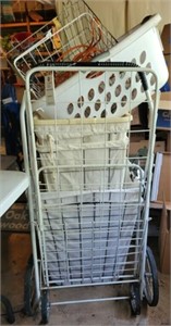 SHOPPING CART AND 5 LAUNDRY BASKETS